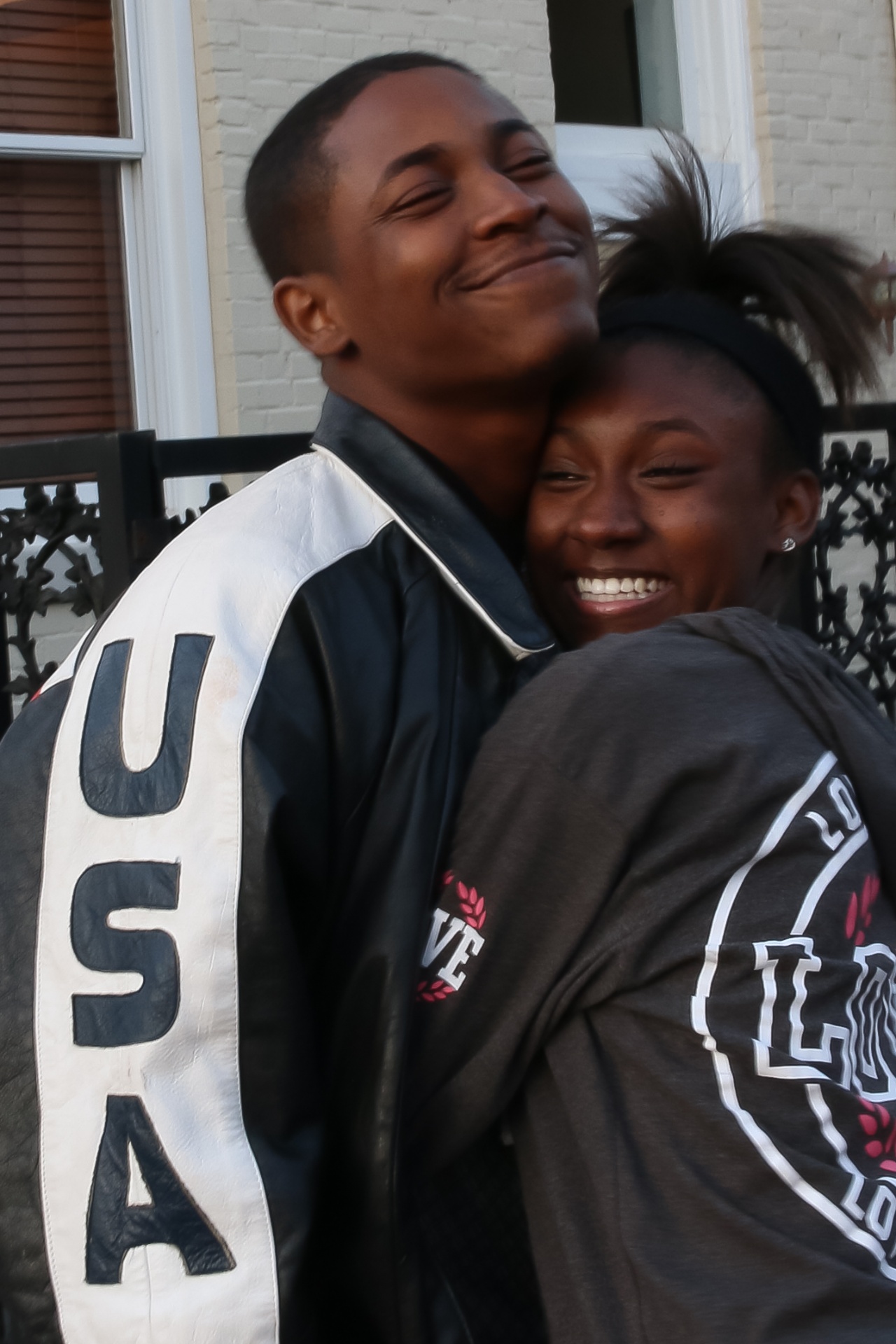 Qevonte sharing a joyful hug with his sister